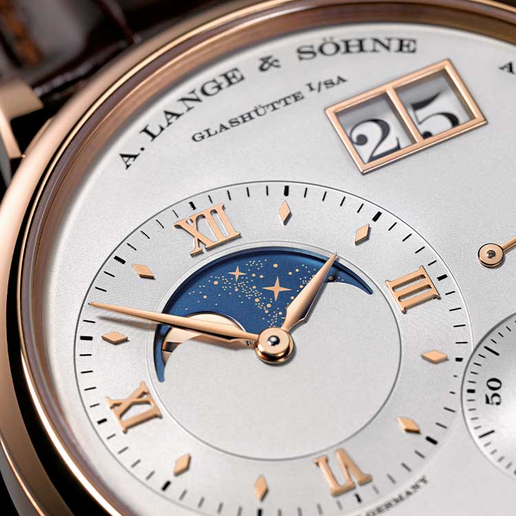 The off-centred dial fake watch has moon phase.